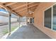 Covered patio with access to the backyard and additional storage space at 503 Credence Ave, Henderson, NV 89002
