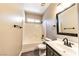 Clean bathroom with a shower-tub combo and a vanity with modern fixtures at 5079 Quiet Falls Ct, Las Vegas, NV 89141