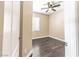 Bedroom featuring hardwood floors and a ceiling fan and a window at 5079 Quiet Falls Ct, Las Vegas, NV 89141