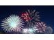 Spectacular fireworks display lighting up the night sky with vibrant colors and dazzling patterns at 5079 Quiet Falls Ct, Las Vegas, NV 89141