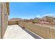 Open patio overlooking neighboring houses and a mountainside in a tranquil setting at 5079 Quiet Falls Ct, Las Vegas, NV 89141