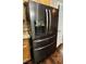 Close up of the stainless-steel refrigerator with water and ice dispenser at 5079 Quiet Falls Ct, Las Vegas, NV 89141