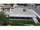 Aerial view of the property featuring a covered patio, well-maintained landscaping, and fencing at 5079 Reno Ct, Las Vegas, NV 89119