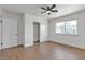 Inviting bedroom features hardwood floors, closet space, and a light and airy atmosphere at 5079 Reno Ct, Las Vegas, NV 89119