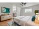 Bright bedroom with a ceiling fan and ensuite bathroom with a double vanity at 5079 Reno Ct, Las Vegas, NV 89119