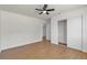 Bedroom features hardwood floors, closet space, and a light and airy atmosphere at 5079 Reno Ct, Las Vegas, NV 89119