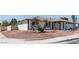 Beautifully landscaped front yard featuring decorative rock and mature palm trees at 5079 Reno Ct, Las Vegas, NV 89119