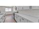 Kitchen featuring a large stone countertop, gas range and stainless steel microwave at 5079 Reno Ct, Las Vegas, NV 89119