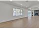 Spacious living room with a large window offering plenty of natural light and modern fireplace at 5079 Reno Ct, Las Vegas, NV 89119