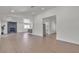 Bright open-concept living room featuring a modern fireplace and stylish flooring at 5079 Reno Ct, Las Vegas, NV 89119