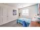 Comfortable bedroom featuring a twin bed, desk, and skateboard decor for a personalized touch at 6521 Cinnamon Hazelnut St # Lot 91, North Las Vegas, NV 89084