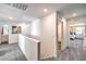 Upstairs hallway with doorways leading to various rooms in the house at 6521 Cinnamon Hazelnut St # Lot 91, North Las Vegas, NV 89084