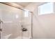 Glass enclosed shower featuring white subway tiles, a built-in bench, and window for natural light at 6521 Cinnamon Hazelnut St # Lot 91, North Las Vegas, NV 89084