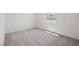 Carpeted bedroom offers natural light from a window at 6712 Violet Cascade Ave, Las Vegas, NV 89156