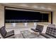 Spacious balcony with comfortable seating and panoramic night views of the city at 677 Overlook Rim Dr, Henderson, NV 89012