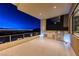 Luxurious balcony featuring an outdoor kitchen and stunning city views at 677 Overlook Rim Dr, Henderson, NV 89012