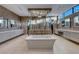 Luxurious bathroom with a freestanding tub, walk-in shower, and modern vanity at 677 Overlook Rim Dr, Henderson, NV 89012