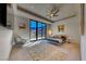 Bright bedroom with large sliding doors and a view at 677 Overlook Rim Dr, Henderson, NV 89012