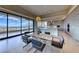 Elegant dining area open to kitchen, features expansive views and sophisticated finishes at 677 Overlook Rim Dr, Henderson, NV 89012