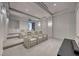 Luxurious home theater featuring tiered seating, custom lighting, and a large screen at 677 Overlook Rim Dr, Henderson, NV 89012