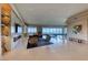 Open-concept living area with floor-to-ceiling windows provides abundant natural light and panoramic views at 677 Overlook Rim Dr, Henderson, NV 89012