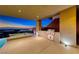 Enjoy this outdoor kitchen and entertaining space with stunning views of the city skyline at 677 Overlook Rim Dr, Henderson, NV 89012