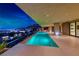 Stunning backyard pool featuring captivating city views, perfect for relaxing and entertaining at 677 Overlook Rim Dr, Henderson, NV 89012