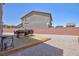 Backyard with a wood deck for outdoor grilling and a rock lawn at 7828 Bright Lodge St, Las Vegas, NV 89139