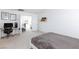 Bright bedroom featuring a neutral palette, carpet flooring, and a comfortable bed at 7828 Bright Lodge St, Las Vegas, NV 89139