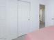 Bedroom featuring a closet with sliding doors and a door leading to another room at 7828 Bright Lodge St, Las Vegas, NV 89139