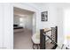 Hallway leading into bedroom, featuring chair, pillows, and decor at 7828 Bright Lodge St, Las Vegas, NV 89139