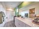 Clean bathroom with a shower with a glass door, a closet, and a large mirror at 7935 Pandora Sky St # 381, North Las Vegas, NV 89084