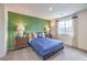Charming bedroom featuring modern decor and lots of natural light at 7935 Pandora Sky St # 381, North Las Vegas, NV 89084