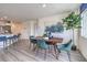 View of dining room and kitchen with several chairs at 7935 Pandora Sky St # 381, North Las Vegas, NV 89084