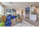 Open floor plan with living room, kitchen, and dining areas at 7935 Pandora Sky St # 381, North Las Vegas, NV 89084