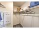 Organized walk-in closet with ample shelving and storage space for clothes and accessories at 7935 Pandora Sky St # 381, North Las Vegas, NV 89084