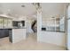 Modern kitchen with gray cabinets, granite countertops, and stainless steel appliances at 8040 Arcadian Ln, Las Vegas, NV 89147