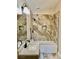 Well-lit bathroom with a tiled shower-tub combination and a modern vanity with neutral tones at 8397 San Ramon Dr, Las Vegas, NV 89147