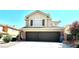 Two-story home with a three-car garage and well-maintained landscaping at 8397 San Ramon Dr, Las Vegas, NV 89147