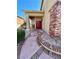 Inviting front entrance featuring a red double door and decorative brick accents at 8397 San Ramon Dr, Las Vegas, NV 89147