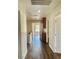 Bright hallway with wood floors and built-in cabinets, providing ample storage space at 8397 San Ramon Dr, Las Vegas, NV 89147