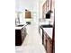 Open-concept kitchen featuring stainless steel appliances and a view to the living room at 8397 San Ramon Dr, Las Vegas, NV 89147