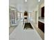 Open kitchen with stainless steel appliances, a central island, and a view to the living room at 8397 San Ramon Dr, Las Vegas, NV 89147
