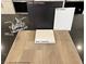 Interior finishes showcase wood-look flooring, granite, paint, cabinet, and faucet samples at 9243 Charmillin Ct, Las Vegas, NV 89148