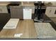 Kitchen featuring sleek matte black faucet, white quartz, and wood flooring at 9249 Charmillin Ct, Las Vegas, NV 89148