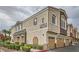 Beautiful condo with attached two-car garage, desert landscaping, and stucco exterior for low-maintenance living at 9303 Gilcrease Ave # 1002, Las Vegas, NV 89149