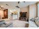 Inviting living room with a large media center and comfortable seating area at 9303 Gilcrease Ave # 1002, Las Vegas, NV 89149