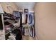 Walk-in closet with wire shelving provides efficient storage solutions for clothing, shoes, and accessories to maximize space at 9370 Corkfish St, Las Vegas, NV 89178
