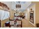 Spacious dining area boasts high ceilings, modern furnishings, and abundant natural light at 9370 Corkfish St, Las Vegas, NV 89178