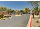 A secure gated entrance welcomes residents into the community, ensuring privacy and peace of mind for homeowners at 9370 Corkfish St, Las Vegas, NV 89178